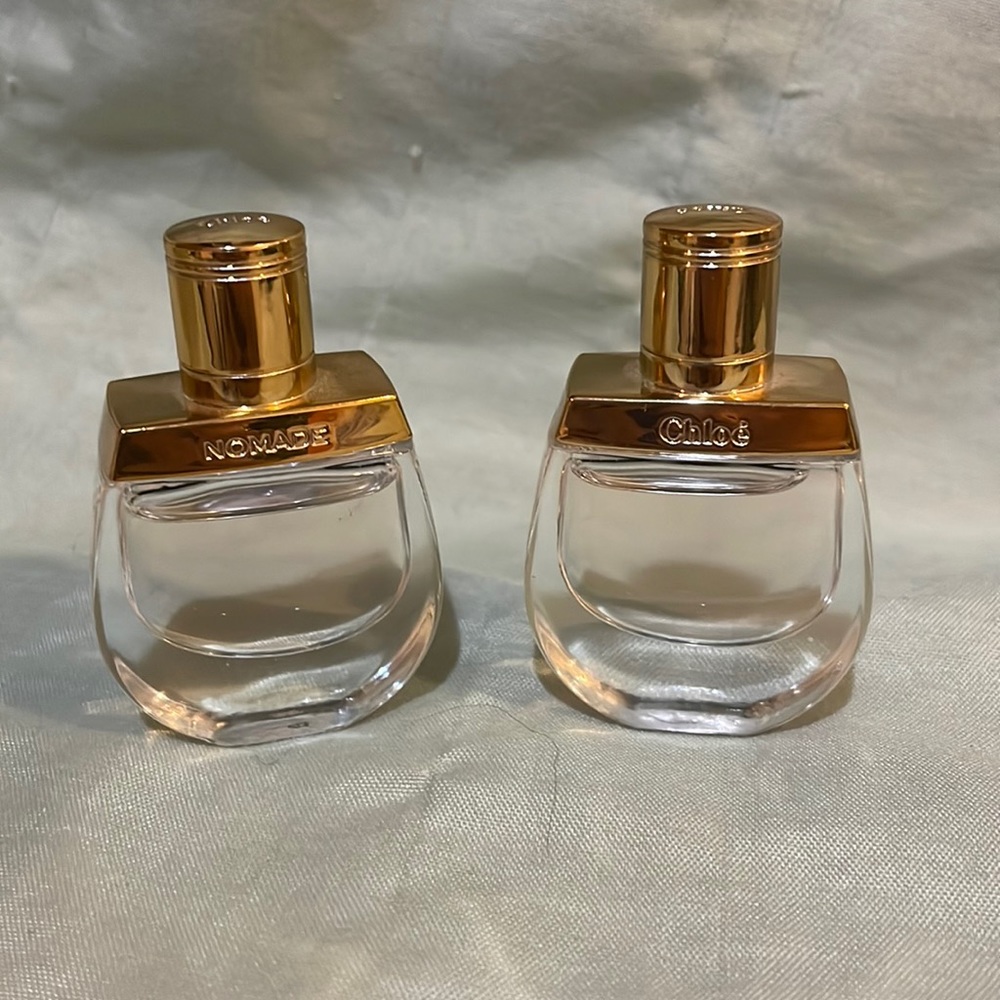 two mini Chloe Nomad perfume bottles
